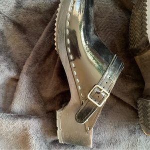 Black patent wooden (black) clogs made in Sweden.